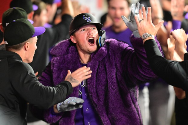 Hunter Goodman #15 of the Colorado Rockies celebrates in the dugout after hitting a home run in the eighth inning against the Los Angeles Angels at Angel Stadium of Anaheim on June 1, 2026 in Anaheim, California. (Photo by John McCoy/Getty Images)