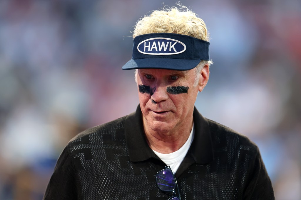 Will Ferrell wearing a visor and eye black at the Home Run Derby.