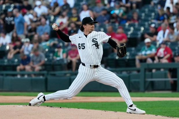 Chicago White Sox starting pitcher Davis Martin throws against the Boston Red Sox during the first inning of a baseball game in Chicago, Wednesday, July 8, 2026. (AP Photo/Nam Y. Huh)