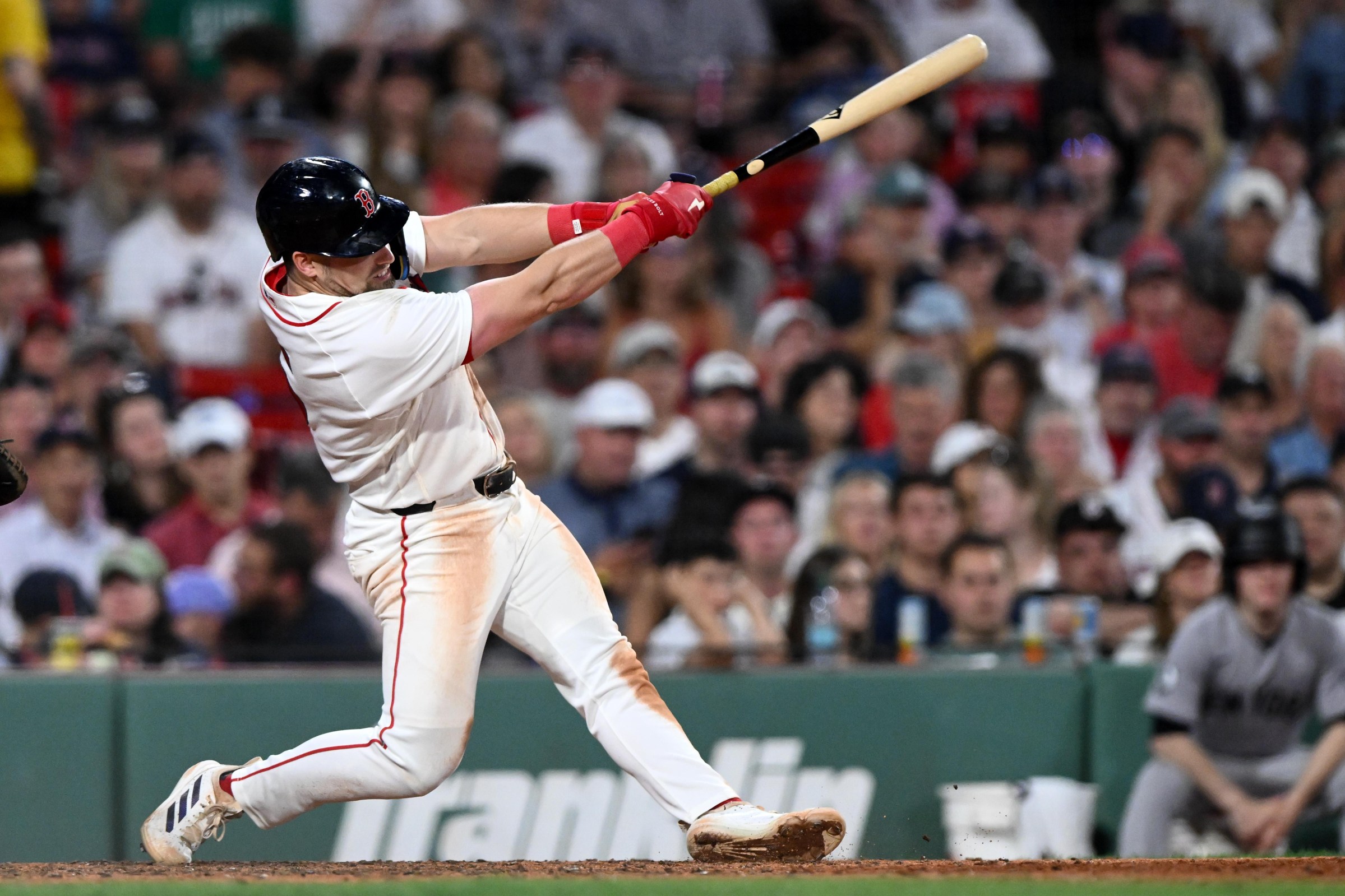 BOSTON, MASSACHUSETTS - JUNE 25: Caleb Durbin #5 of the Boston Red Sox hits a two-run home run against the New York Yankees during the fifth inning at Fenway Park on June 25, 2026 in Boston, Massachusetts. (Photo by Brian Fluharty/Getty Images)