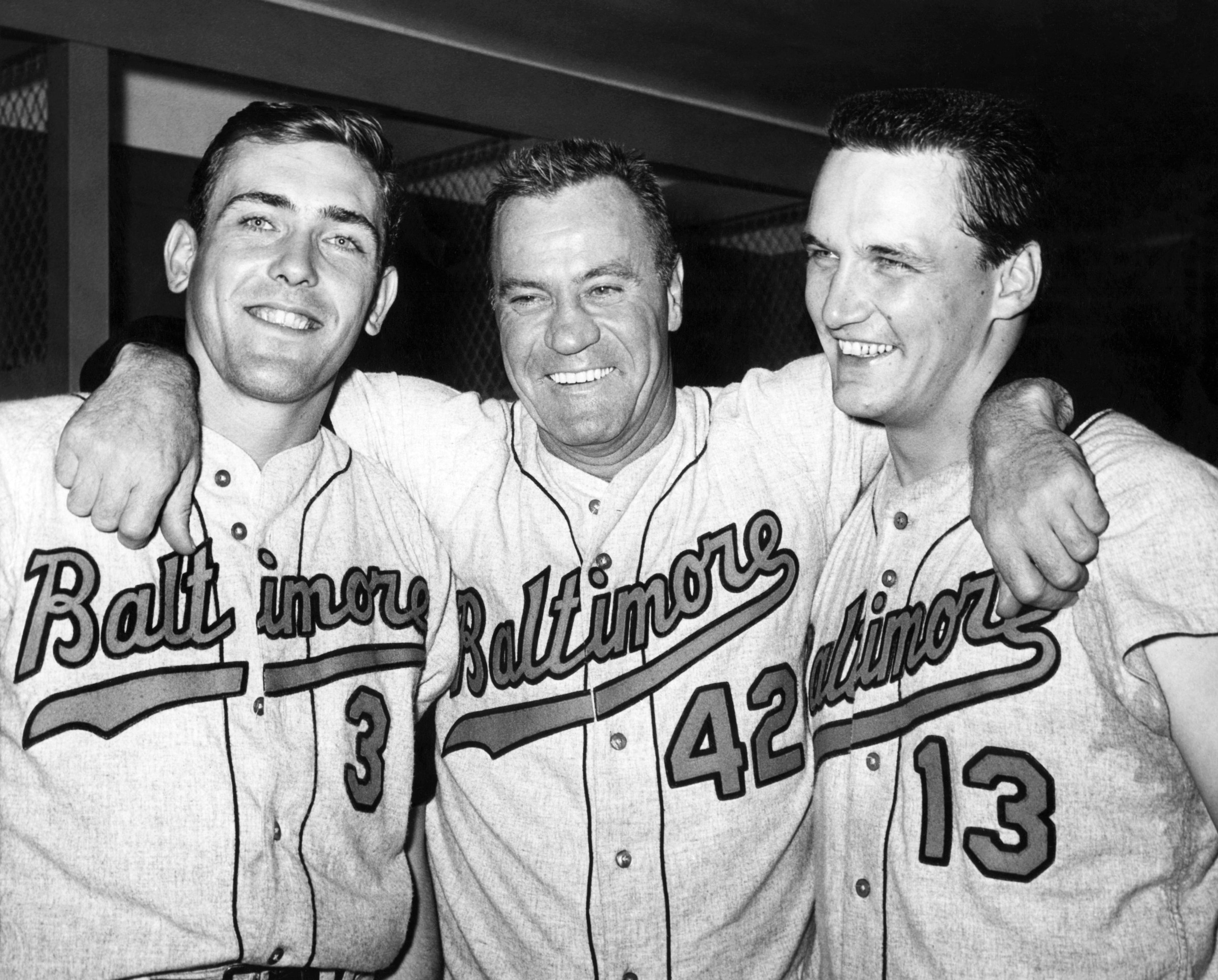 BRONX, NY - JUNE 22: Manager Hank Bauer #42 of the Baltimore Orioles poses with Curt Blefary #3 and Steve Barber #13 after an MLB game against the New York Yankees on June 22, 1966 at Yankee Stadium in the Bronx, New York. (Photo by Bruce Bennett Studios via Getty Images Studios/Getty Images)