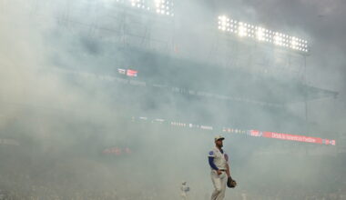 Cubs fans sing `Take Me Home, Country Roads' during fog delay at Wrigley Field