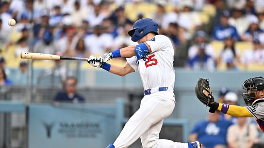 Los Angeles Dodgers left fielder Tommy Edman (25) hits an RBI double against the Arizona Diamondbacks during the third inning at Dodger Stadium. Los Angeles Dodgers left fielder Tommy Edman (25) hits an RBI double against the Arizona Diamondbacks during the third inning at Dodger Stadium.