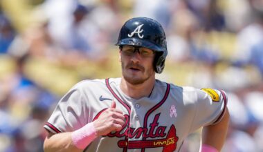 May 10, 2026; Los Angeles, California, USA; Atlanta Braves catcher Sean Murphy (12) scores against the Los Angeles Dodgers during the second inning at Dodger Stadium. Mandatory Credit: Kirby Lee-Imagn Images