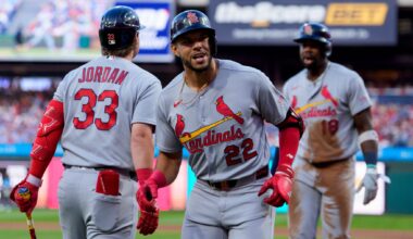 Bohm's triple in the 10th scores 2 runs as the Phillies beat the Cardinals 7-6