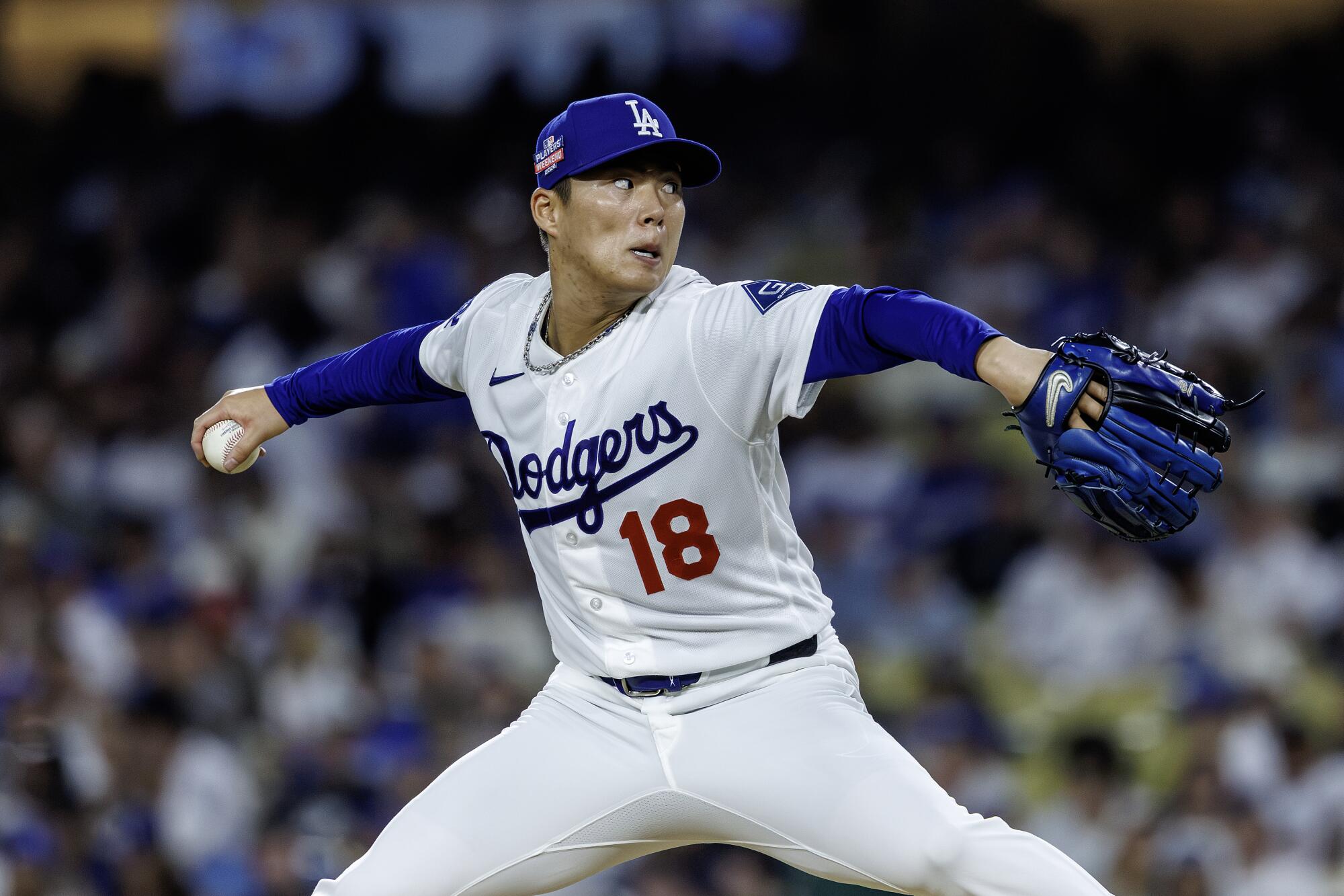 Dodgers pitcher Yoshinobu Yamamoto delivers against the Pittsburgh Pirates in the second inning Friday night.