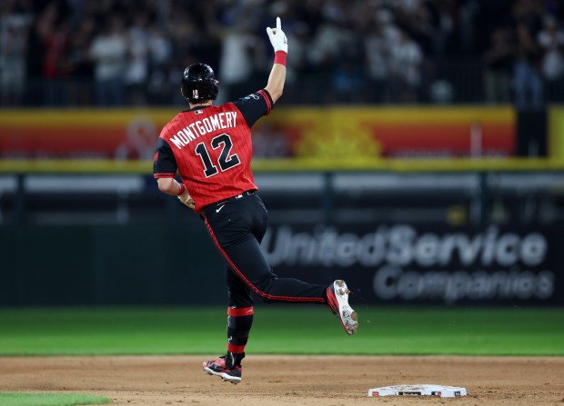 Chicago White Sox designated hitter Colson Montgomery (12) celebrates as he rounds the bases after hitting a solo home run in the sixth inning of a game against the New York Mets at Rate Field in Chicago on Aug. 21, 2026. (Chris Sweda/Chicago Tribune)