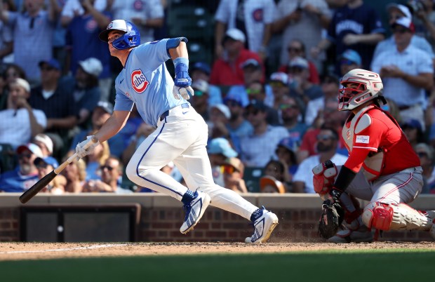Cubs pinch hitter Matt Shaw hits a double in the eighth inning against the Reds on Aug. 28, 2026, at Wrigley Field. (Chris Sweda/Chicago Tribune)