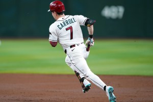 Aug 6, 2026; Phoenix, Arizona, USA; Arizona Diamondbacks right fielder Corbin Carroll (7) runs to second base en route to a double against the San Diego Padres during the third inning at Chase Field. Mandatory Credit: Joe Camporeale-Imagn Images
