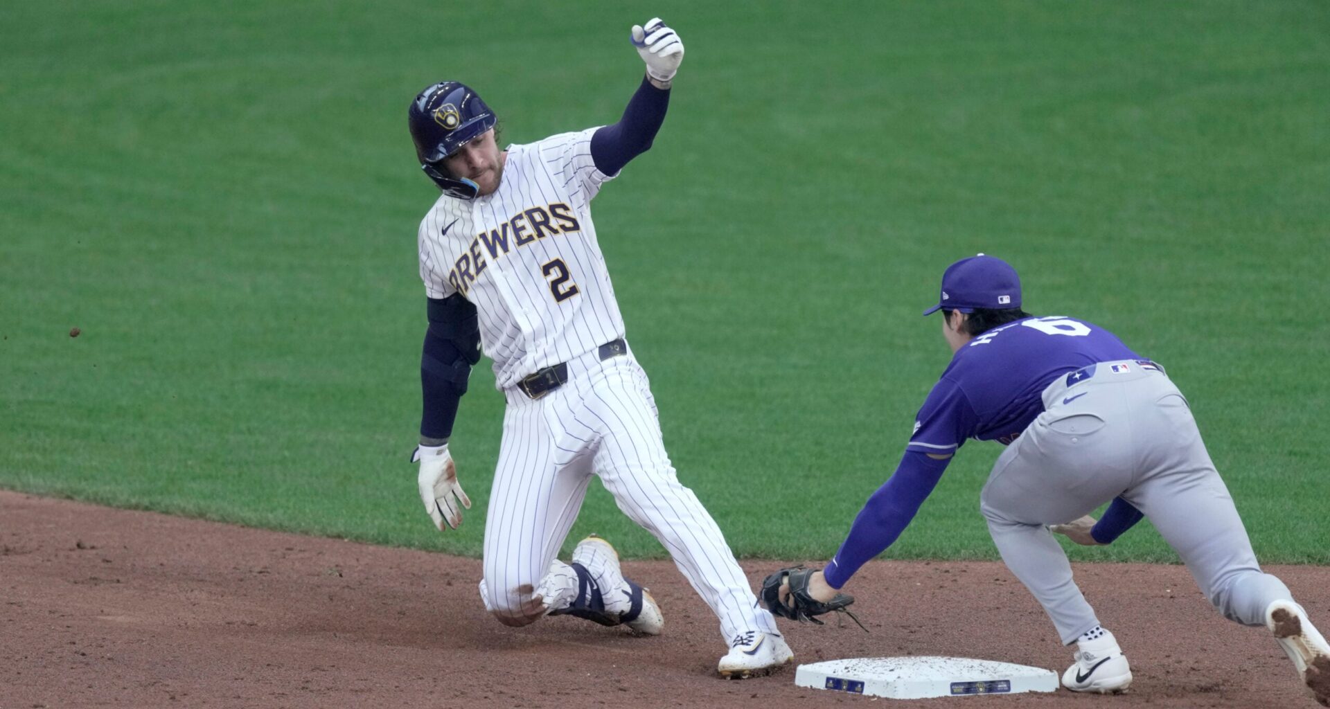 Brewers reacquaint with powerful Dodgers in battle for top NL record