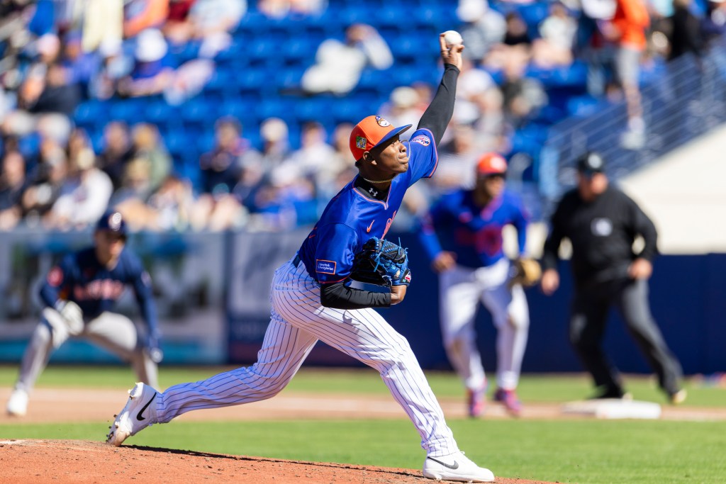 New York Mets pitcher throwing a baseball during spring training.