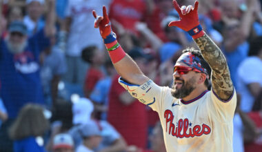 Philadelphia Phillies designated hitter Kyle Schwarber (12) celebrates his walk-off two-run home run during the ninth inning against the St. Louis Cardinals at Citizens Bank Park.