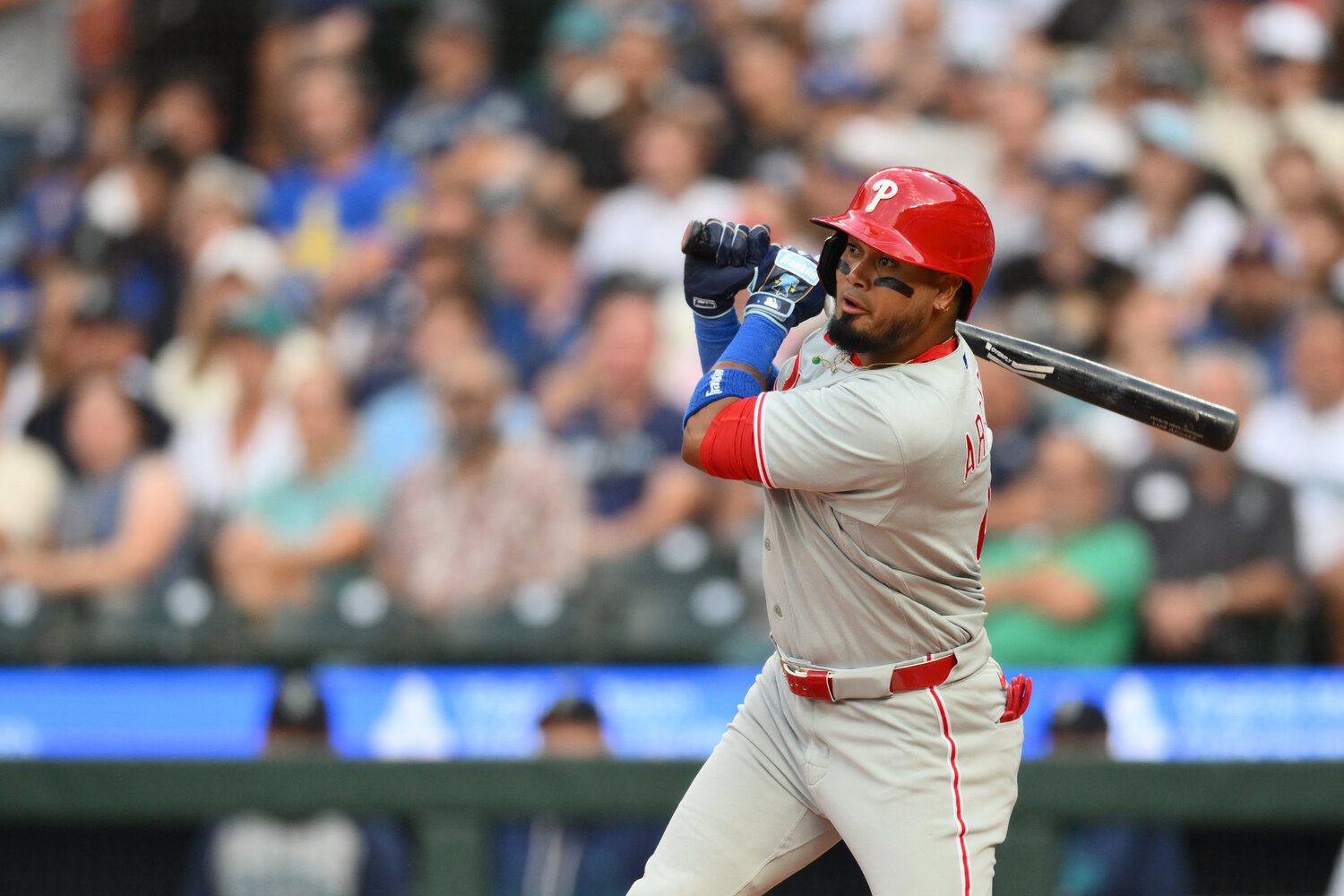 Philadelphia Phillies second baseman Luis Arraez (4) hits a single against the Seattle Mariners during the third inning at T-Mobile Park.