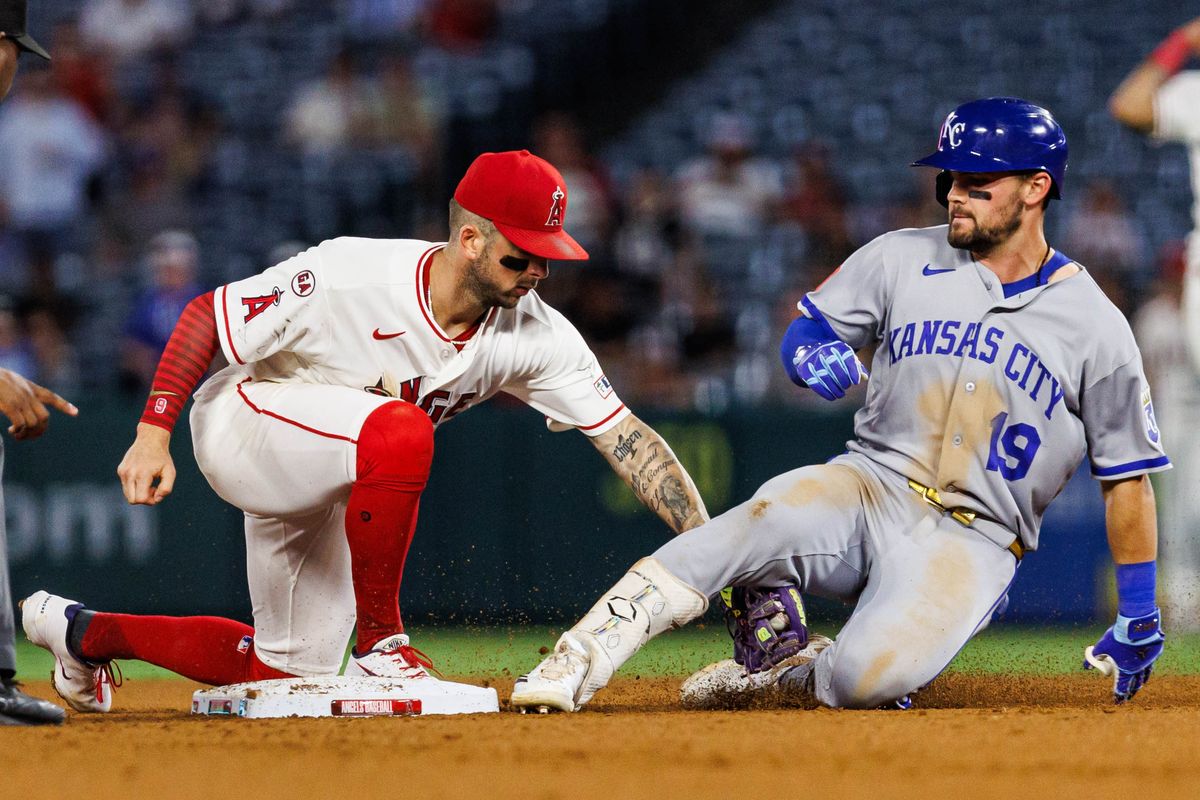 Zach Neto #9 of the Los Angeles Angels tags out Michael Massey #19 of the Kansas City Royals during an MLB game against the Kansas City Royals on August 14, 2026 at Angel Stadium in Anaheim, California. Zach Neto #9 of the Los Angeles Angels tags out Michael Massey #19 of the Kansas City Royals during an MLB game against the Kansas City Royals on August 14, 2026 at Angel Stadium in Anaheim, California.