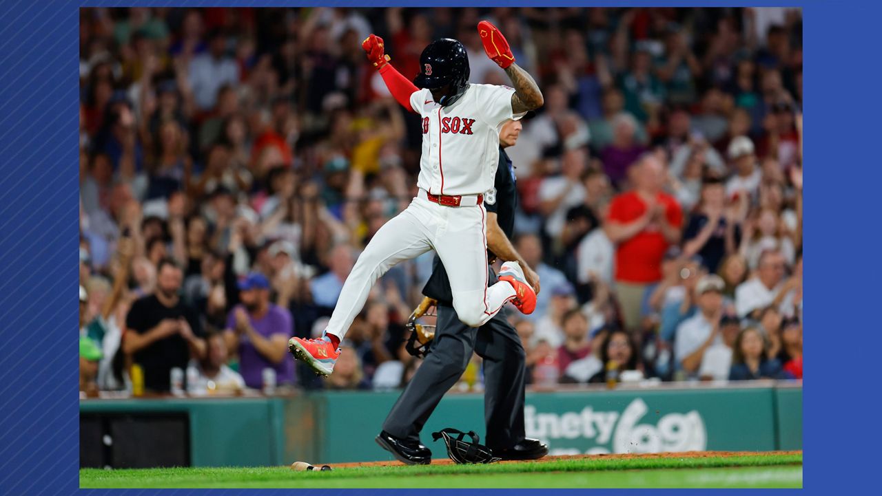 Boston Red Sox's Ceddanne Rafaela leaps over equipment after scoring during the sixth inning of a baseball game against the Arizona Diamondbacks Monday, Aug. 17, 2026, in Boston. (AP Photo/CJ Gunther)