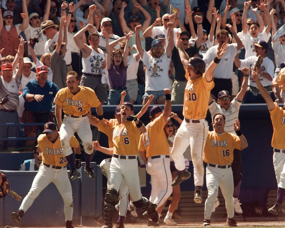 Louisiana State players jump for joy as the team wins the national championship with a two-run...