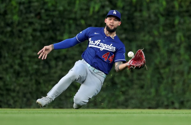 Los Angeles Dodgers center fielder Andy Pages (44) catches a line drive hit by Chicago Cubs right fielder Seiya Suzuki in the first inning of a game at Wrigley Field in Chicago on Aug. 4, 2026. (Chris Sweda/Chicago Tribune)