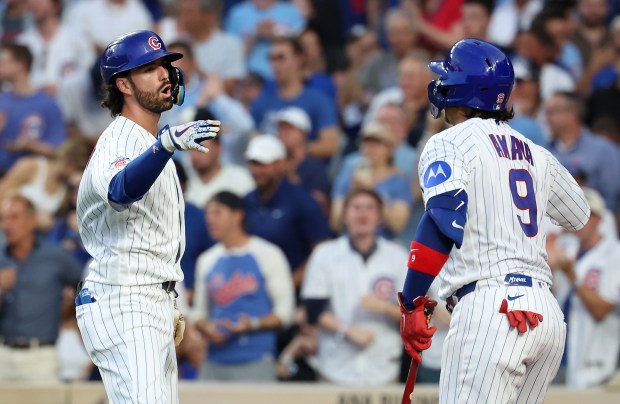 Chicago Cubs shortstop Dansby Swanson celebrates after hitting a solo home run in the third inning of a game against the Los Angeles Dodgers at Wrigley Field in Chicago on Aug. 4, 2026. (Chris Sweda/Chicago Tribune)