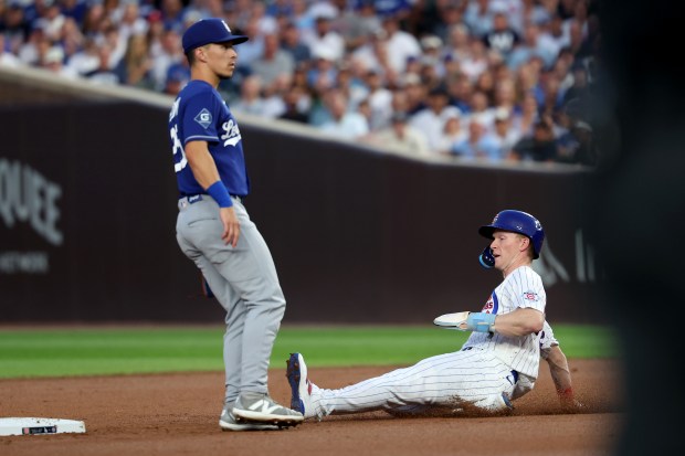 Chicago Cubs center fielder Pete Crow-Armstrong (4) steals second base in the third inning of a game against the Los Angeles Dodgers at Wrigley Field in Chicago on Aug. 4, 2026. (Chris Sweda/Chicago Tribune)