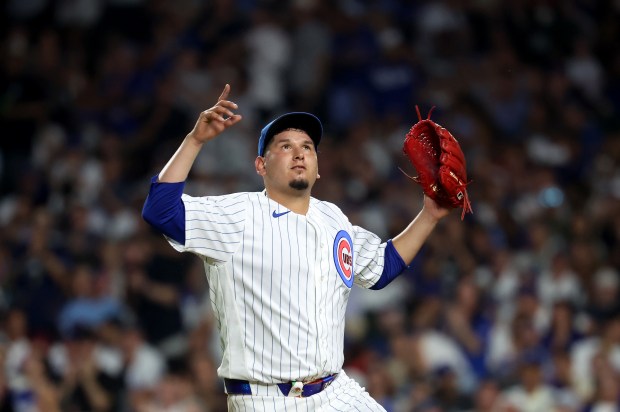Chicago Cubs starting pitcher Javier Assad looks skyward after being taken out of the game in the sixth inning against the Los Angeles Dodgers at Wrigley Field in Chicago on Aug. 4, 2026. (Chris Sweda/Chicago Tribune)