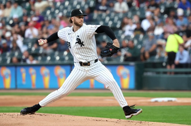 Chicago White Sox starting pitcher Sean Burke (59) delivers to the Texas Rangers in the first inning of a game at Rate Field in Chicago on Aug. 26, 2026. (Chris Sweda/Chicago Tribune)