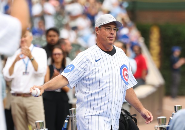 Greg Maddux is introduced for the Chicago Cubs 150th anniversary team ceremony before a Cubs-Reds game at Wrigley Field on Aug. 29, 2026, in Chicago. (John J. Kim/Chicago Tribune)