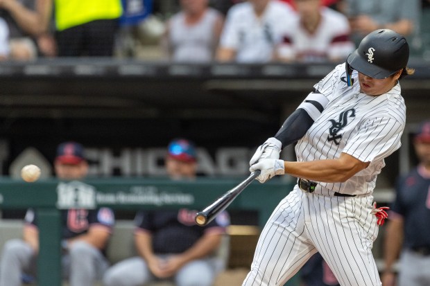 Chicago White Sox first baseman Munetaka Murakami (5) hits an RBI double in the first inning of a baseball game between the Cleveland Guardians and Chicago White Sox at Rate Field in Chicago, Sunday, Aug. 9, 2026. (Arthur Maiorella/Chicago Tribune)