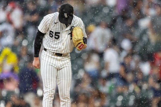Chicago White Sox pitcher Davis Martin (65) pitches in the rain during the second inning of a baseball game between the Cleveland Guardians and Chicago White Sox at Rate Field in Chicago, Sunday, Aug. 9, 2026. (Arthur Maiorella/Chicago Tribune)