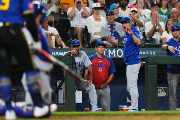 Cubs manager Craig Counsell reacts from the dugout after starter Matthew Boyd was called for a balk in the fifth inning against the Mariners on Friday, Aug. 21, 2026, in Seattle. Counsell was ejected from the game, and the Cubs lost 6-5 in 10 innings. (Lindsey Wasson/AP)