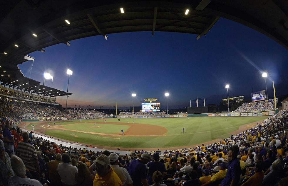 Fans at Alex Box Stadium watch during the third inning of an NCAA college baseball tournament...