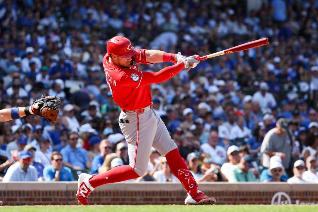 Tyler Stephenson hits a three-run home run in the sixth inning against the Chicago Cubs at Wrigley Field on August 28, 2026 in Chicago, Illinois.