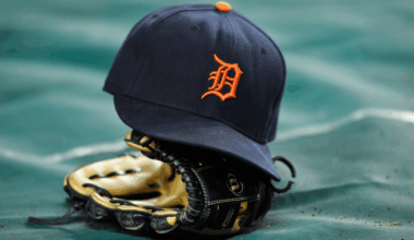 A detail of a Detroit Tigers hat and glove are seen during warm ups against the New York Yankees during Game Five of the American League Championship Series at Yankee Stadium on October 6, 2011 in the Bronx borough of New York City. (Photo by Patrick McDermott/Getty Images)