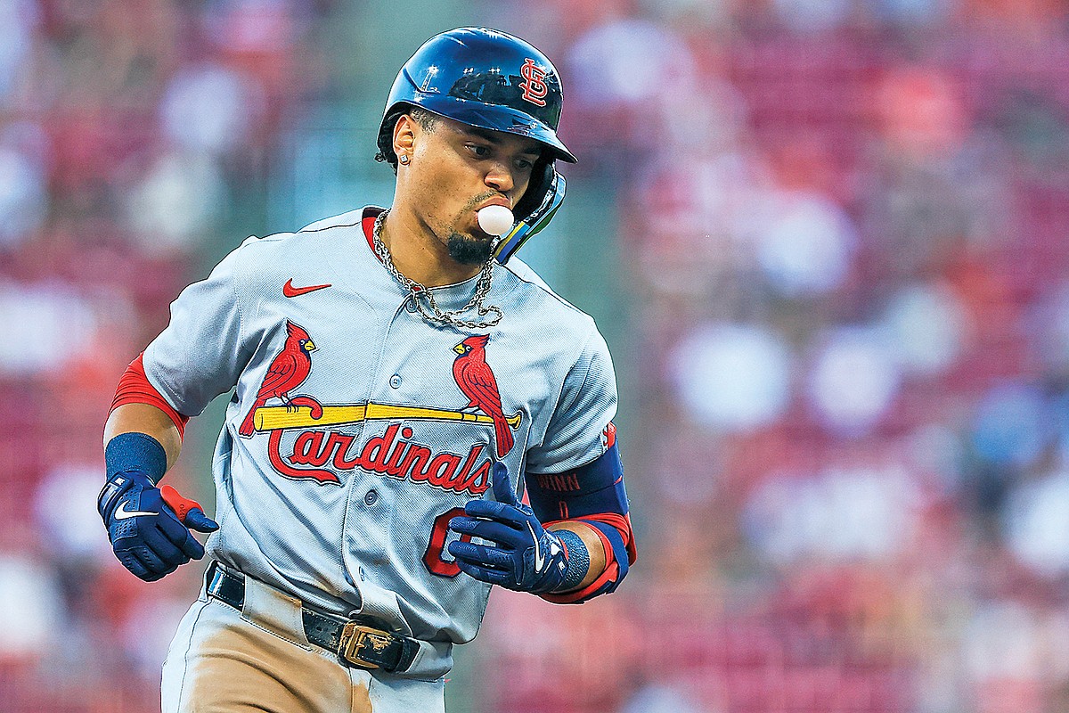 Winn’s big day helps Cardinals keep rolling against Reds in 3-0 win