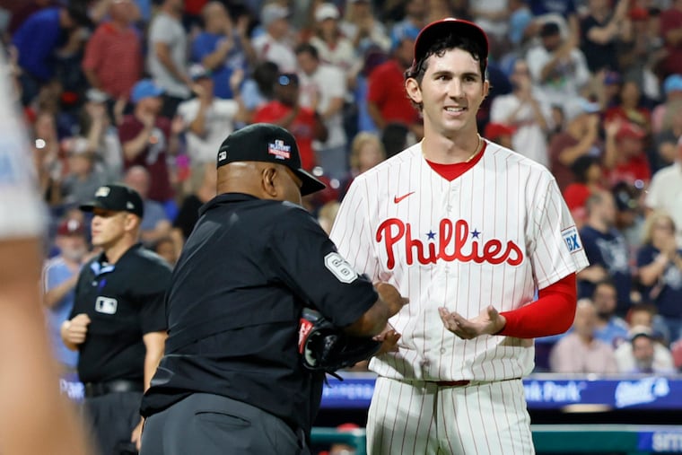 Phillies pitcher Andrew Painter smiles as he comes out of the seventh inning of the St. Louis Cardinals at Philadelphia Phillies MLB game at Citizens Bank Park in Philadelphia on Saturday, August 22, 2026.