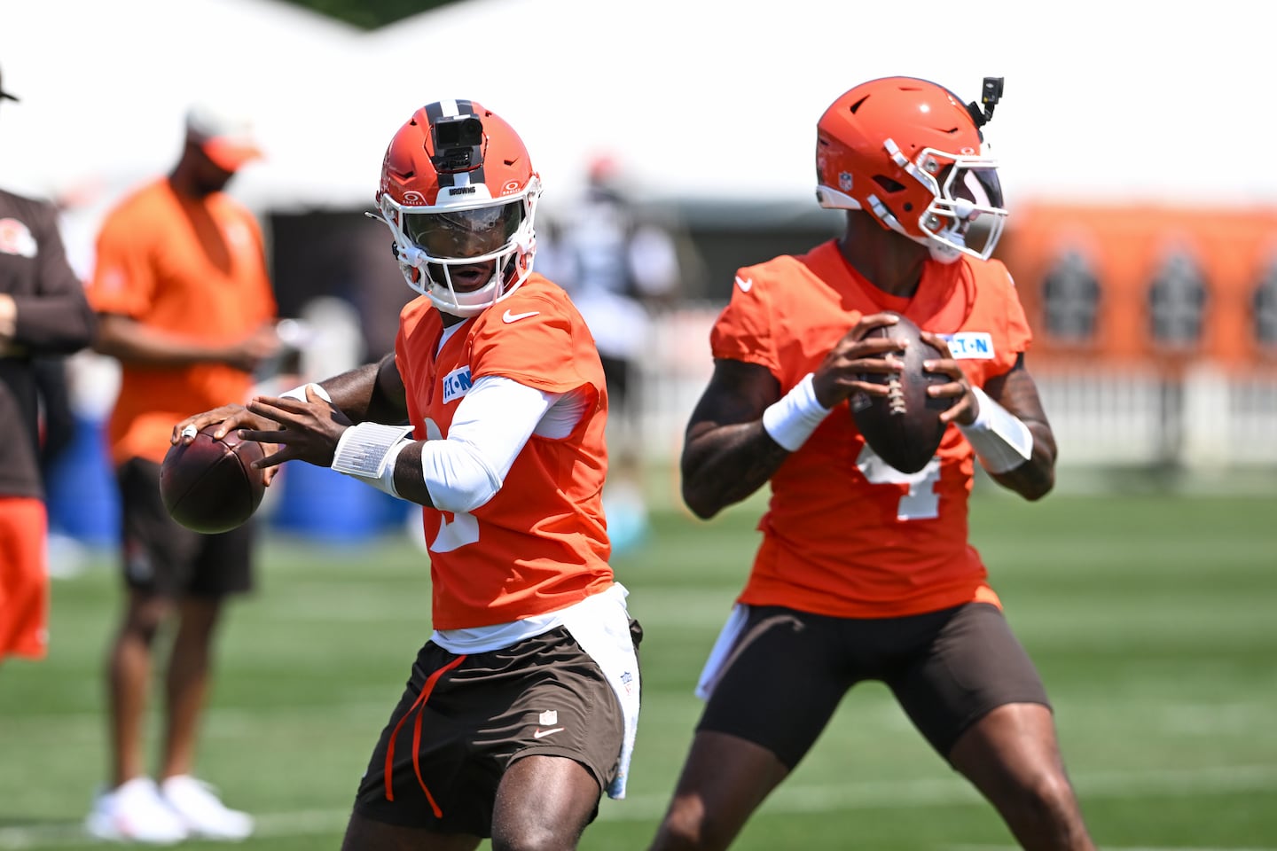 Shedeur Sanders (left) and Deshaun Watson are in a competition to become the Browns' starting quarterback.