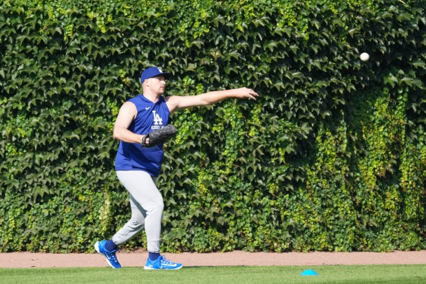 Los Angeles Dodgers pitcher Tarik Skubal warms up before a game against the Chicago Cubs at Wrigley Field on Monday, Aug. 3, 2026, in Chicago. (AP Photo/David Banks)