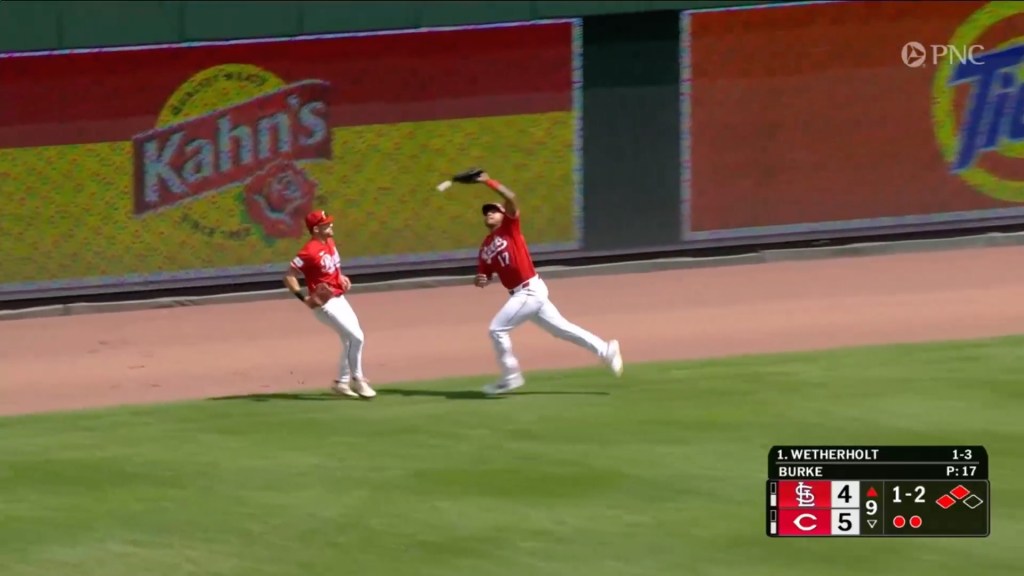 Cincinnati Reds center fielder Dane Myers misses catching a ball, resulting in a gaffe.