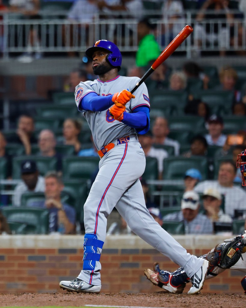 Luis Robert Jr. watching his home run against the Atlanta Braves.