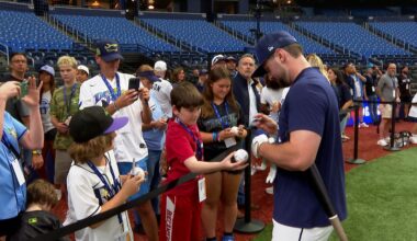 Rays catcher Liam Hicks signs autographs at Tropicana Field on Friday, August 14th before his first home game since being traded to Tampa Bay. (Michael Epps - Spectrum Sports 360)