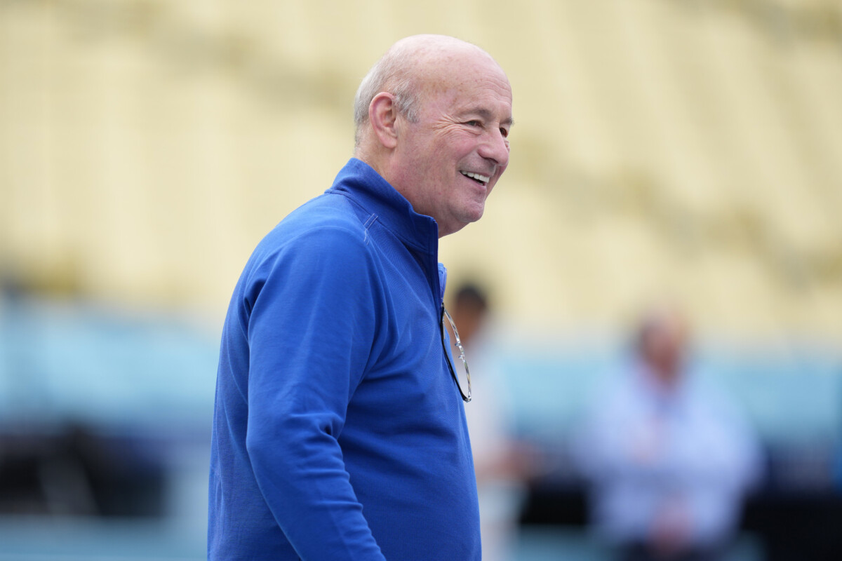 Mar 30, 2026; Los Angeles, California, USA; Los Angeles Dodgers president Stan Kasten watches batting practice before the game against the Cleveland Guardians at Dodger Stadium. Mandatory Credit: Kirby Lee-Imagn Images