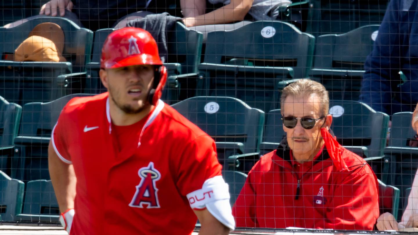 Mar 16, 2021; Tempe, Arizona, USA; Los Angeles Angels owner Arte Moreno (right) and outfielder Mike Trout against the Cleveland Indians during a Spring Training game at Tempe Diablo Stadium. Mandatory Credit: Mark J. Rebilas-USA TODAY Sports