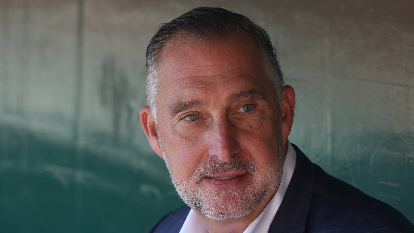 Pittsburgh, Pennsylvania, USA;  Los Angeles Angels interim general manager John Mozeliak looks on in the dugout before the game against the Pittsburgh Pirates at PNC Park.  Mandatory Credit: Charles LeClaire-Imagn Images