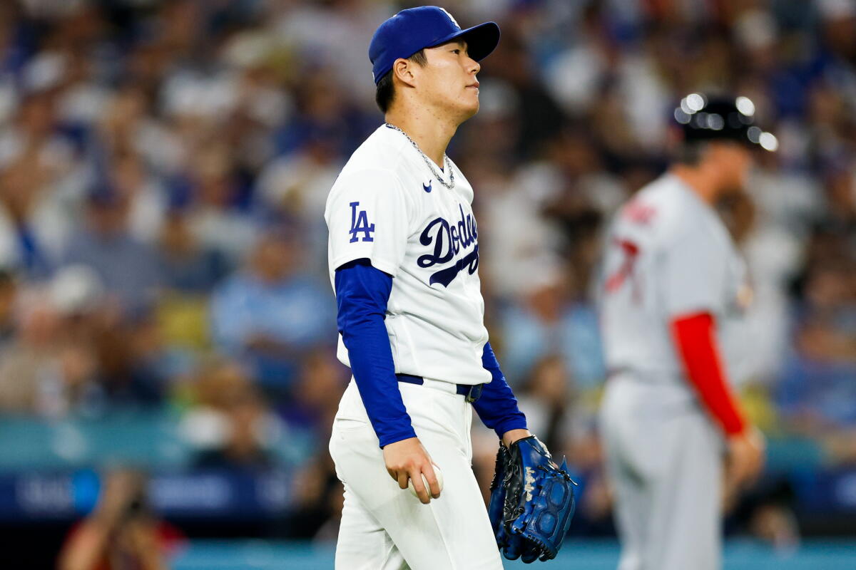 Yoshinobu Yamamoto walks back to the mound after giving up a home run to Thomas Saggese in the sixth inning Wednesday.
