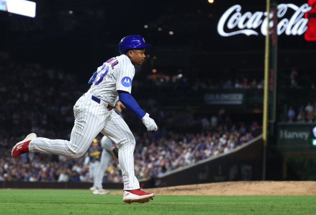 Chicago Cubs designated hitter BJ Murray Jr. (83) sprints down the line as he earns his first major league hit on an infield single in the sixth inning of a game against the Milwaukee Brewers at Wrigley Field in Chicago on Sept. 1, 2026. (Chris Sweda/Chicago Tribune)