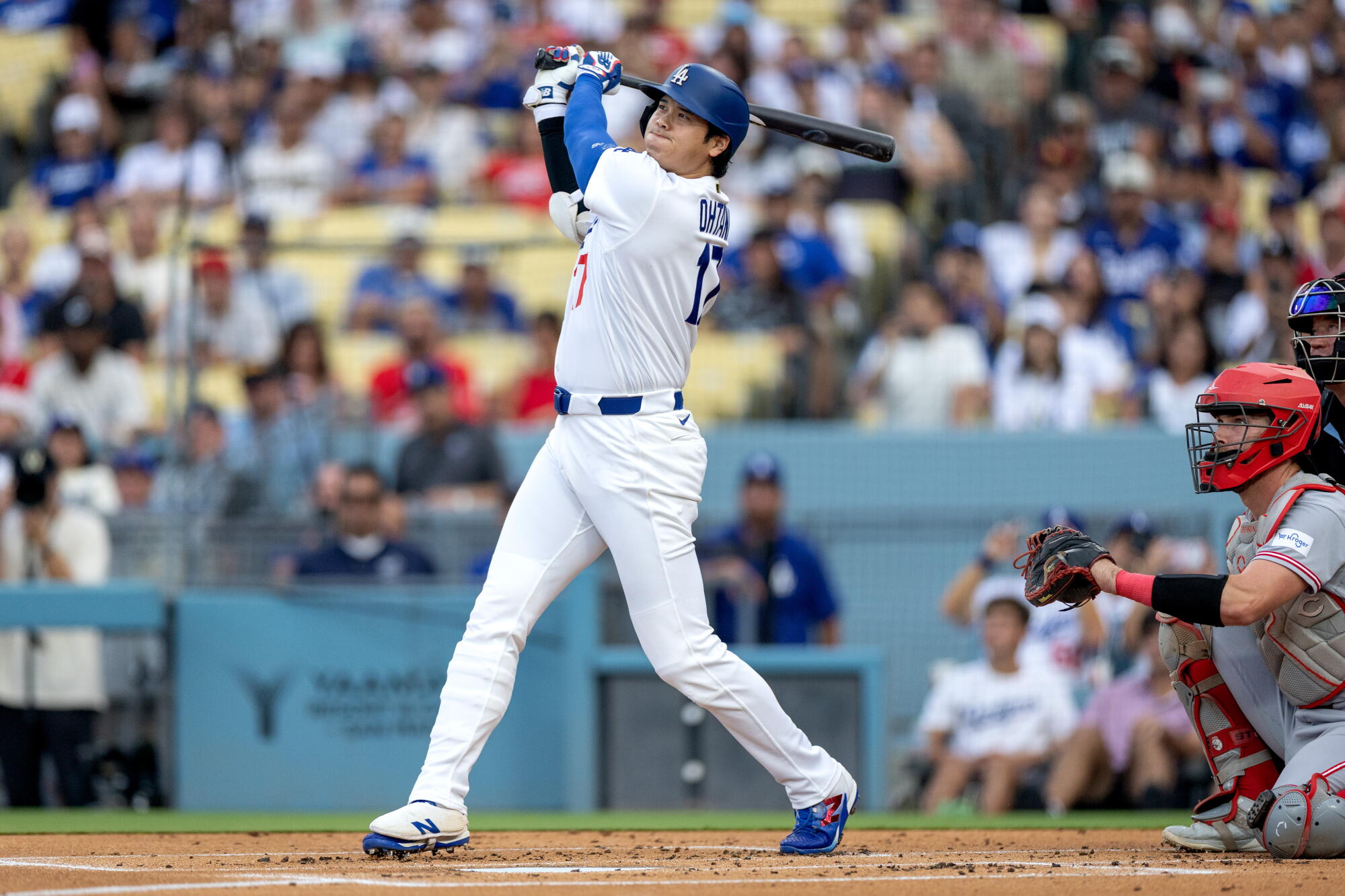 Dodgers star Shohei Ohtani flies out to left field against the Cincinnati Reds at Dodger Stadium on Monday.
