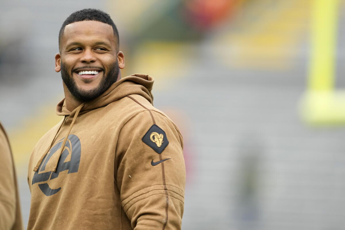 Aaron Donald smiles before a game between the Rams and Green Bay Packers at Lambeau Field in November 2023.