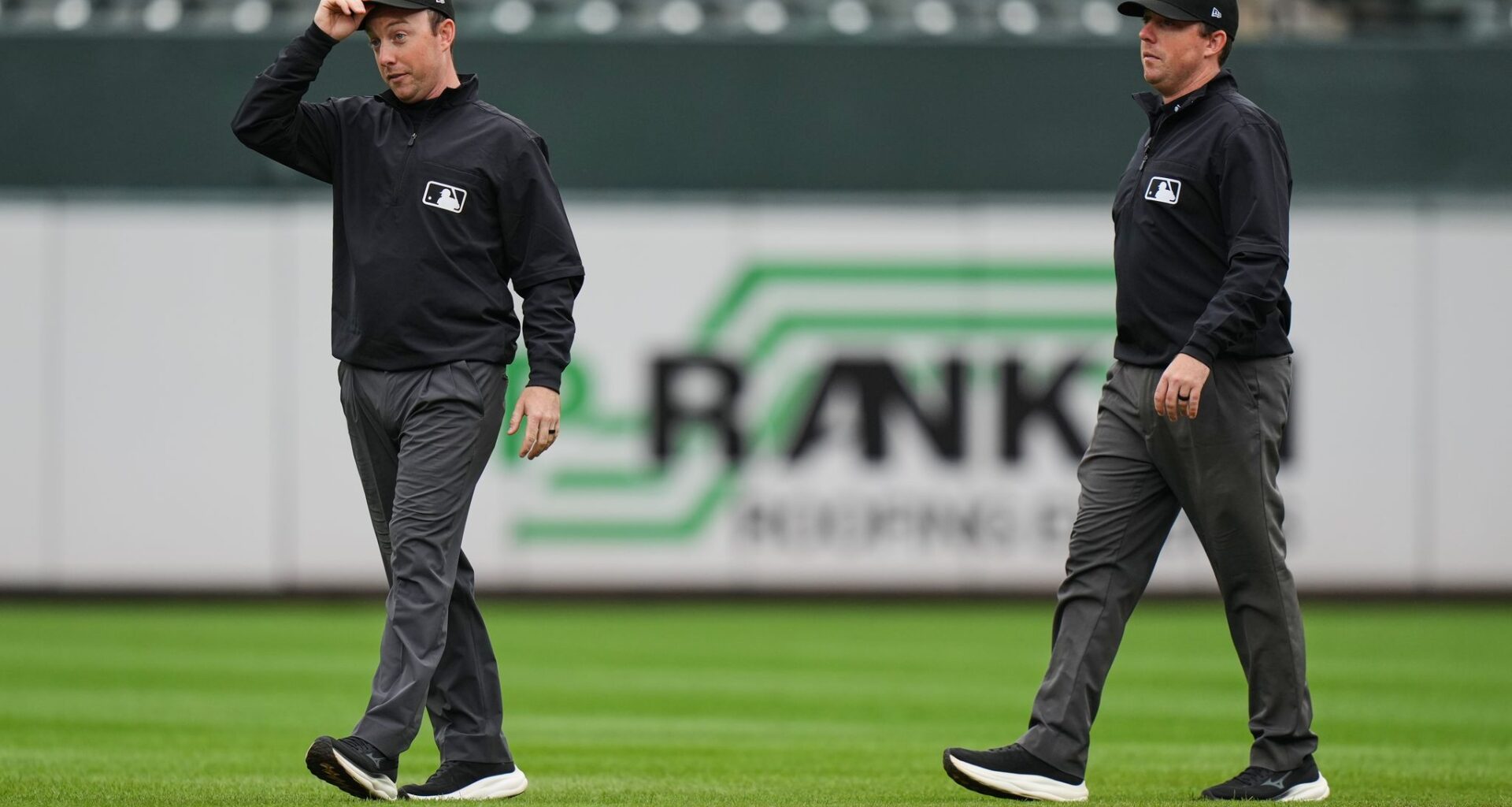 Twin brothers Austin and Tyler Jones ump a big league game together for the first time