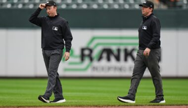 Twin brothers Austin and Tyler Jones ump a big league game together for the first time