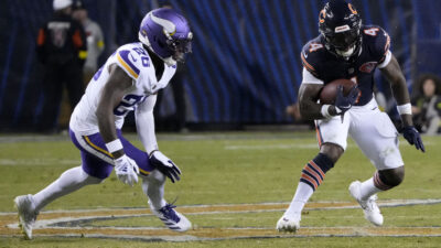 Sep 8, 2025; Chicago, Illinois, USA; Chicago Bears running back D'Andre Swift (4) rushes the ball against the Minnesota Vikings during the second half at Soldier Field.