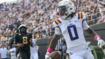 Oct 18, 2025; Nashville, Tennessee, USA; Louisiana State Tigers wide receiver Zavion Thomas (0) celebrates with his teammates after scoring a touchdown against the Vanderbilt Commodores during the second half at FirstBank Stadium. Mandatory Credit: Steve Roberts-Imagn Images